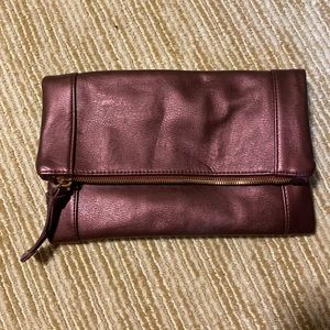 Medium size cute, maroon in color.